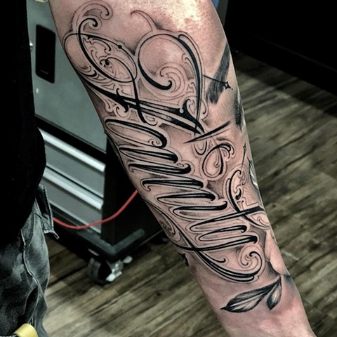 Script Style Tattoo